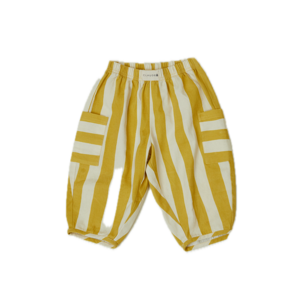 Toddler in pants that are a sun-bleached tonal golden stripe with contrast pocket direction.