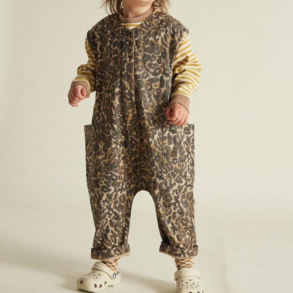 The Wren sleeveless and oversized Leopard print overall made with 100% soft organic cotton featuring tortoiseshell style buttons down to the crotch and playfully large, oversized pockets.